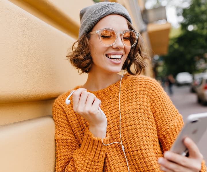 woman listening to online courses
